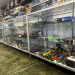 Grinders, scales, wooden hand pipes, and metal pipes at El Paso Smoke Shop flagship on N Desert Blvd