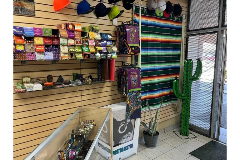 Fox Plaza Smoke Shop’s Hispanic heritage tribute corner featuring a sera[e and papel picado decorations.