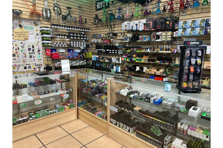 Vape juice, disposable vapes, shisha, and torches lineup at Mesa Smoke Shop on N Mesa St