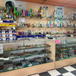 Montana Smoke Shop — colorful glass hand pipes, bongs, bubblers and dab rigs in our wall display — Five Points District, El Paso, TX