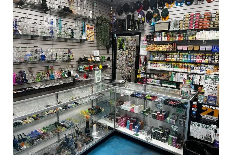 Ceramic glass, nicotine disposable vapes, cigarillos, and paper cones at Resler Vape Shop.
