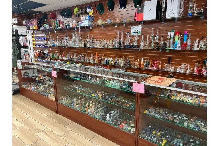 American-handmade glass bongs and hand pipes display at Yandell Smoke Shop, Central El Paso
