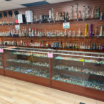 High-end glass case at Yandell Smoke Shop — hand pipes, bongs and bubblers in Central El Paso