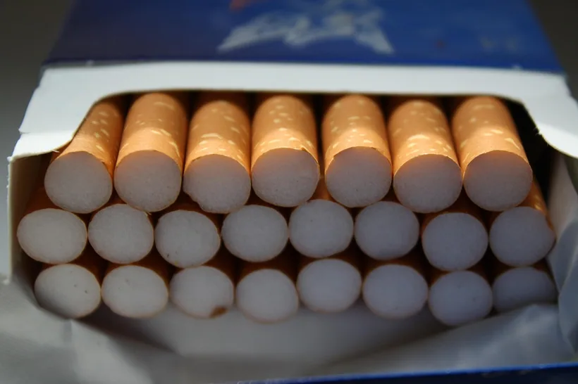 Open pack of filtered cigarettes showing the cork filter ends that define full-flavor versus light tubes at El Paso Smoke Shops