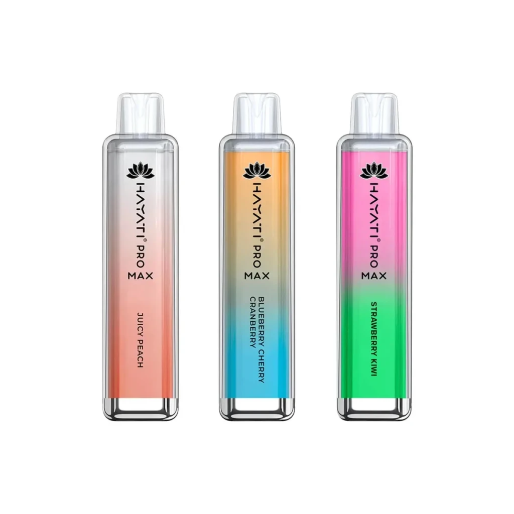 Three flavored disposable vape devices standing side by side on a clean white studio background at El Paso Smoke Shops