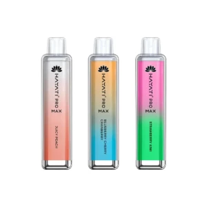 Three flavored disposable vape devices standing side by side on a clean white studio background at El Paso Smoke Shops