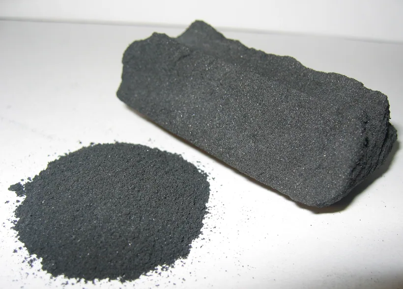 A block and loose powder of activated carbon, the odor-adsorbing material used to line smell-proof bags, at El Paso Smoke Shops