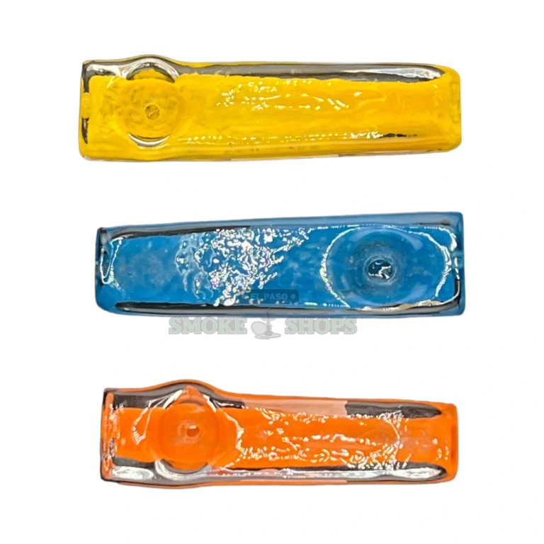 Colorful Pickle novelty glass pipe standing upright in El Paso, pickle design, glass spoon pipe el paso smoke shop