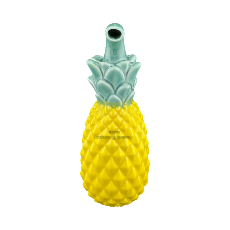 Side view of Pineapple ceramic hand pipe in El Paso showing the dry-herb bowl and side carb, Roast & Toast novelty piece