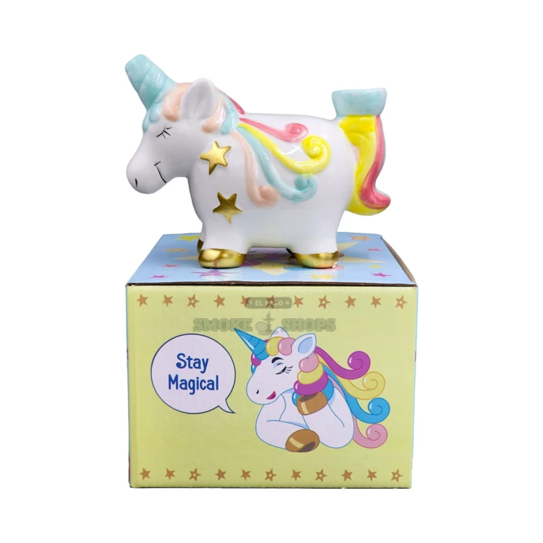 Roast & Toast Unicorn ceramic pipe standing upright in El Paso, pastel novelty hand pipe with gold feet, about 7 inches tall