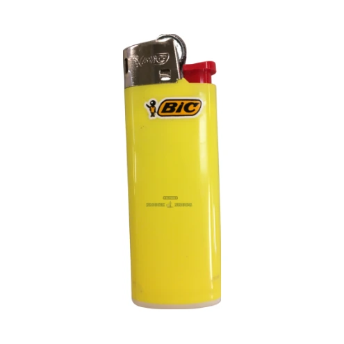 Bic Mini soft-flame lighter lit in El Paso, single open flame from a disposable pocket lighter, pick up today