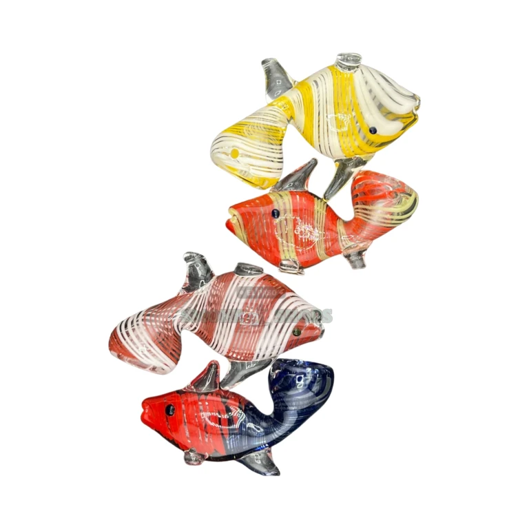 Smoking Nemo glass spoon pipe top view in El Paso, bright swirls on clear glass, glass spoon pipe