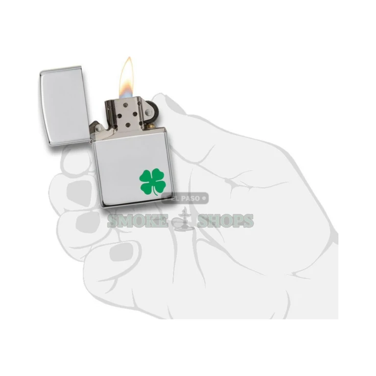 Open Zippo A Bit O' Luck clover lighter showing the windproof chimney and flame