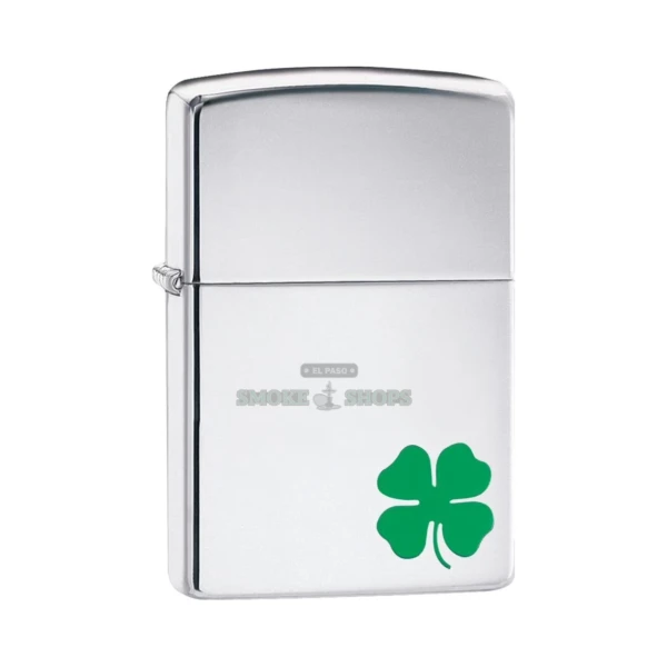 Zippo A Bit O' Luck High Polish Chrome windproof lighter with a small green four-leaf clover in the lower-right corner, front view