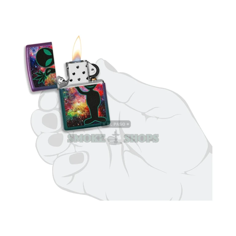 Zippo Alien Design lighter held in hand for everyday-carry scale in El Paso