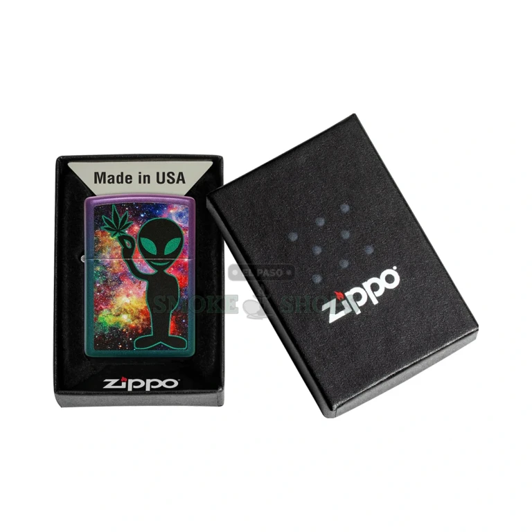 Zippo Alien Design windproof lighter with extraterrestrial artwork on a brass case, lid closed, at El Paso Smoke Shops