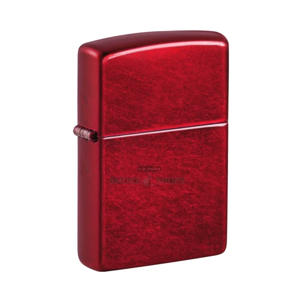Zippo Candy Apple Red windproof lighter 21063 standing closed, showing the glossy translucent red Iced finish