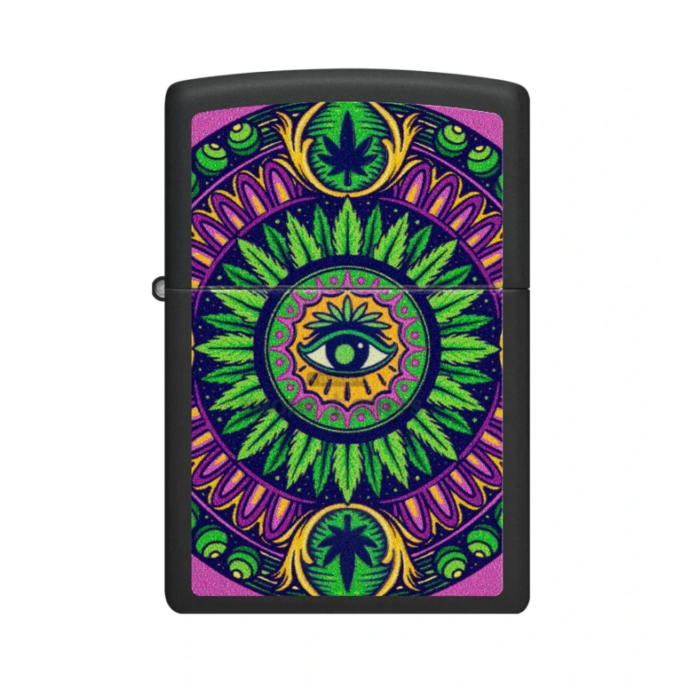 Zippo Cannabis Black Light lighter glowing bluish under UV light with the mandala design illuminated