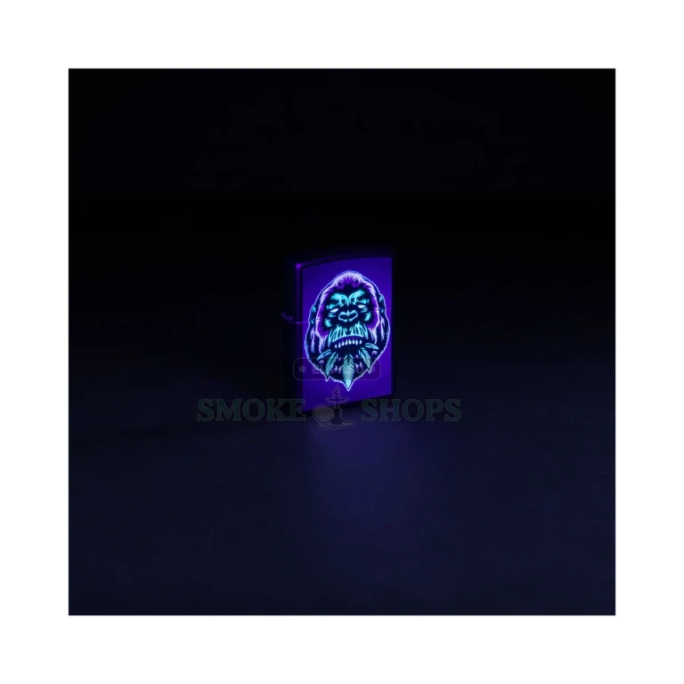 Cannabis Gorilla design glowing blue under a UV black light on a Black Matte Zippo lighter