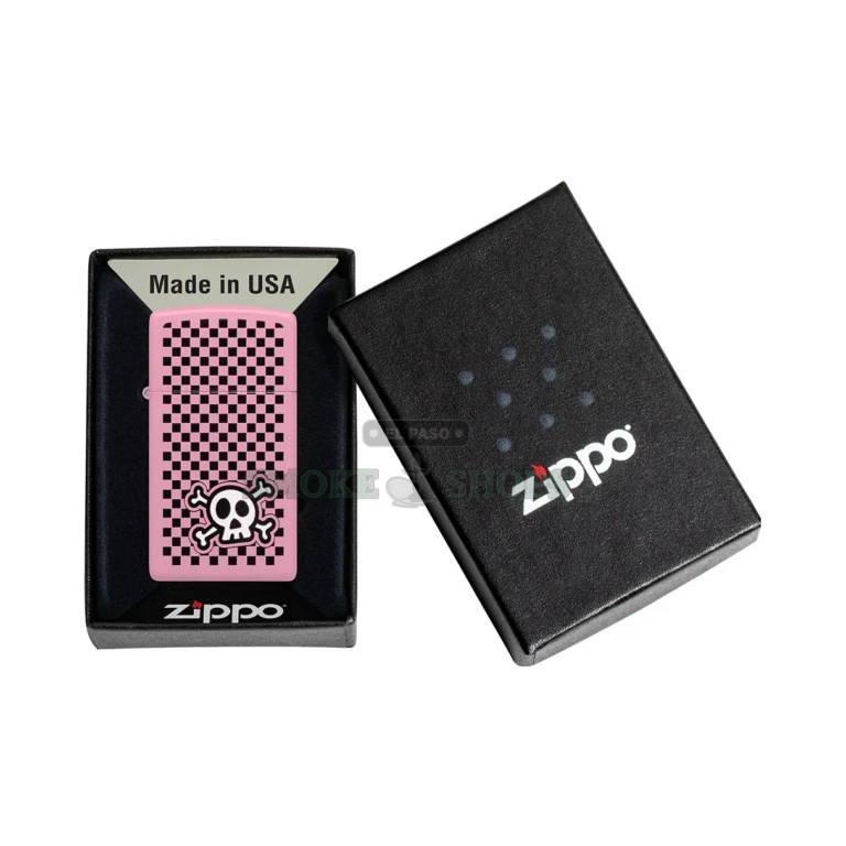 Zippo Checkered Skull slim lighter in pink matte finish with a tattoo-style skull over a black-and-white checkerboard pattern, shown closed