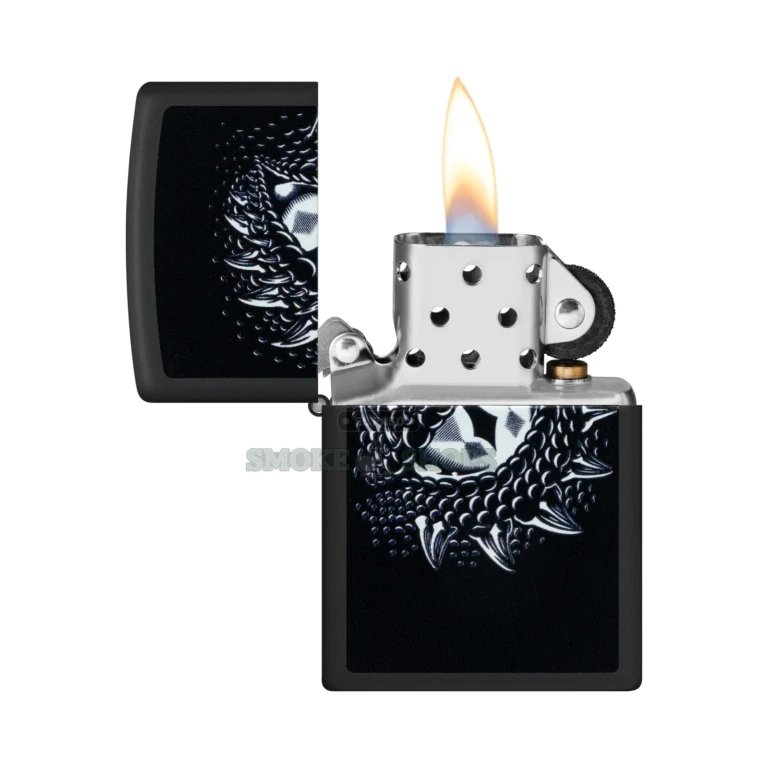 Zippo 48608 Dragon Eye design glowing a bluish color under a UV black light