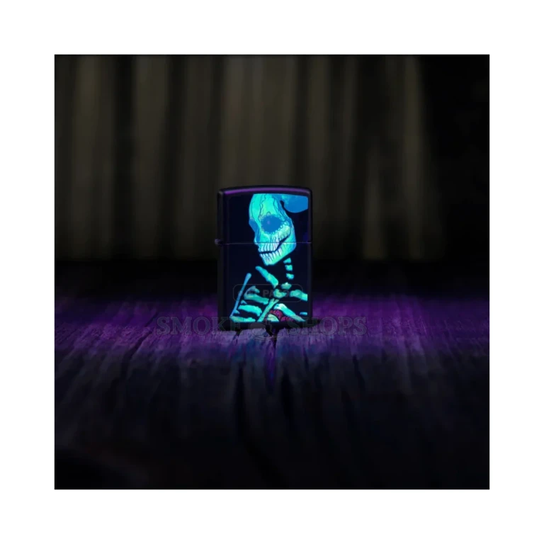 Zippo Glowing Skull lighter in its gift box on the counter at an El Paso Smoke Shops store