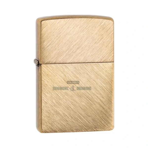 Zippo Herringbone Sweep brass windproof lighter model 29830, lid closed, showing the brushed herringbone pattern on the brass case