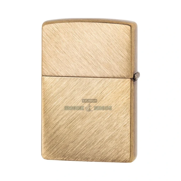 Zippo Herringbone Sweep brass lighter shown in its Zippo gift box