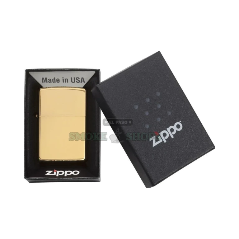 Zippo 254B high polish brass lighter held in hand for pocket-size scale