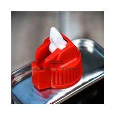 Zippo premium lighter fluid 4oz can held in hand at an El Paso Smoke Shops counter, same-day in-store pickup