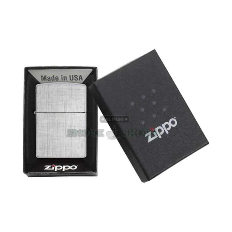 Zippo Linen Weave lighter held in a hand to show the full-size Classic case
