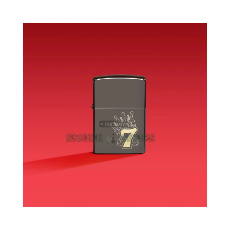 Zippo 48913 Black Ice Laser Two-Tone case showing the Lucky 7 gambling design in brass and chrome