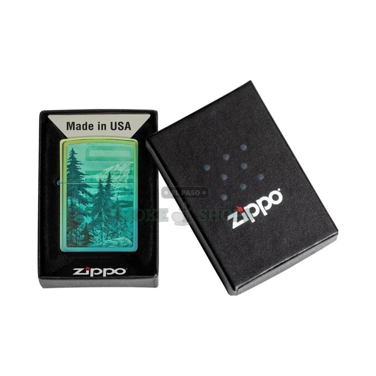 Zippo Mountain Design windproof lighter in High Polish Teal, model 49461, closed front view showing a mountainside framed by pine trees