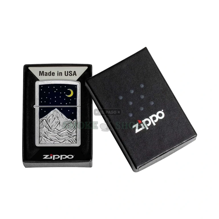 Zippo Mountain Emblem windproof lighter 48632 in Street Chrome, with a sculpted crescent moon and stars over a mountainscape emblem on the front