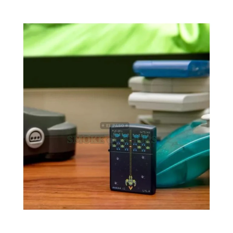 Open Zippo Pixel Game lighter showing the windproof chimney, wick, and flame on a navy matte case