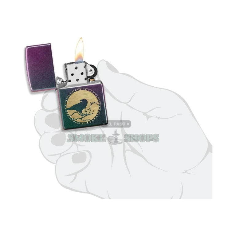 Solid brass Zippo Raven lighter shown closed at pocket size, roughly 1.5 by 2.25 inches