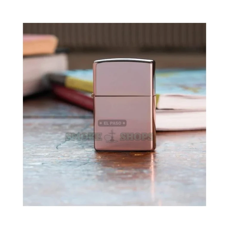 Rose gold Zippo 49190 shown open with the lid flipped back, revealing the windproof chimney and flint wheel