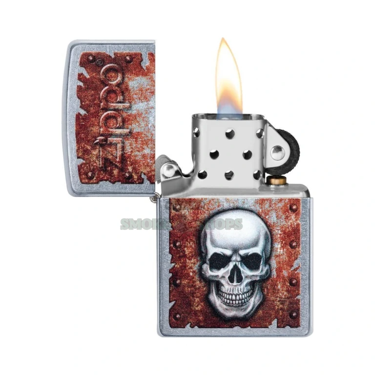 Zippo Rusted Skull lighter shown open with the windproof chimney and lit flame