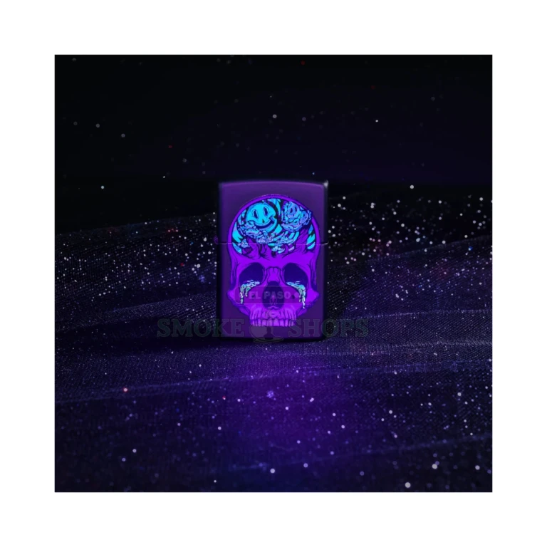Zippo Skull Moon 48737 design glowing under a black light, UV-reactive ink fluorescing across the skull and mushrooms