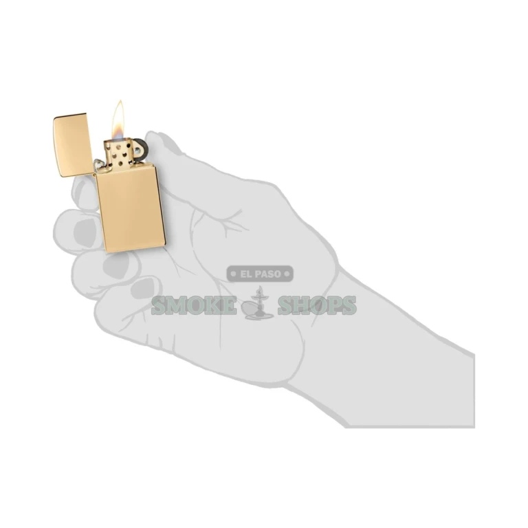 Zippo Slim High Polish Brass windproof lighter model 1654B with a mirror-finish solid brass case, lid closed