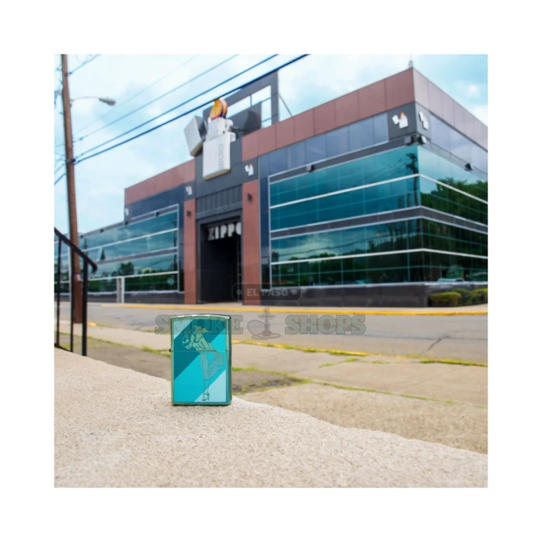 Zippo 48457 Teal Windy lighter open, showing the windproof windscreen and wick