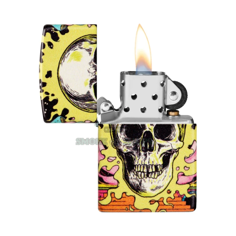 Zippo Trippy Skull lighter glowing in the dark after being charged under light