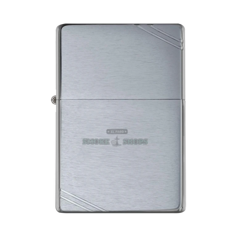 Zippo Vintage Brushed Chrome lighter open with the flame lit and the windproof chimney visible