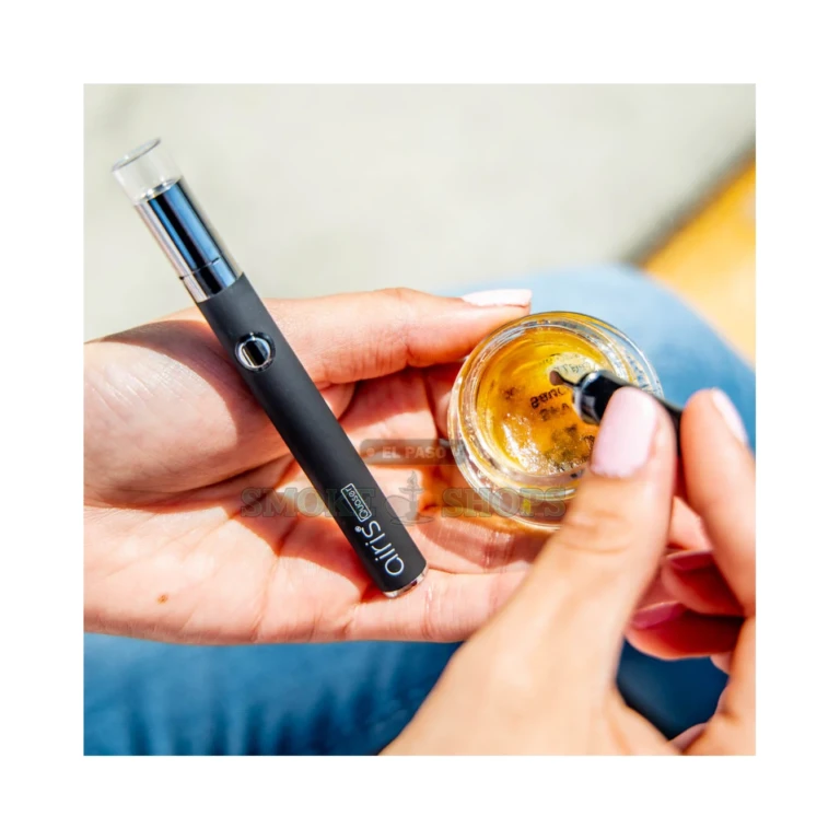 Airistech Quaser dab pen in El Paso showing 510-threaded Qcell quartz coil and hidden ear-scoop dab tool