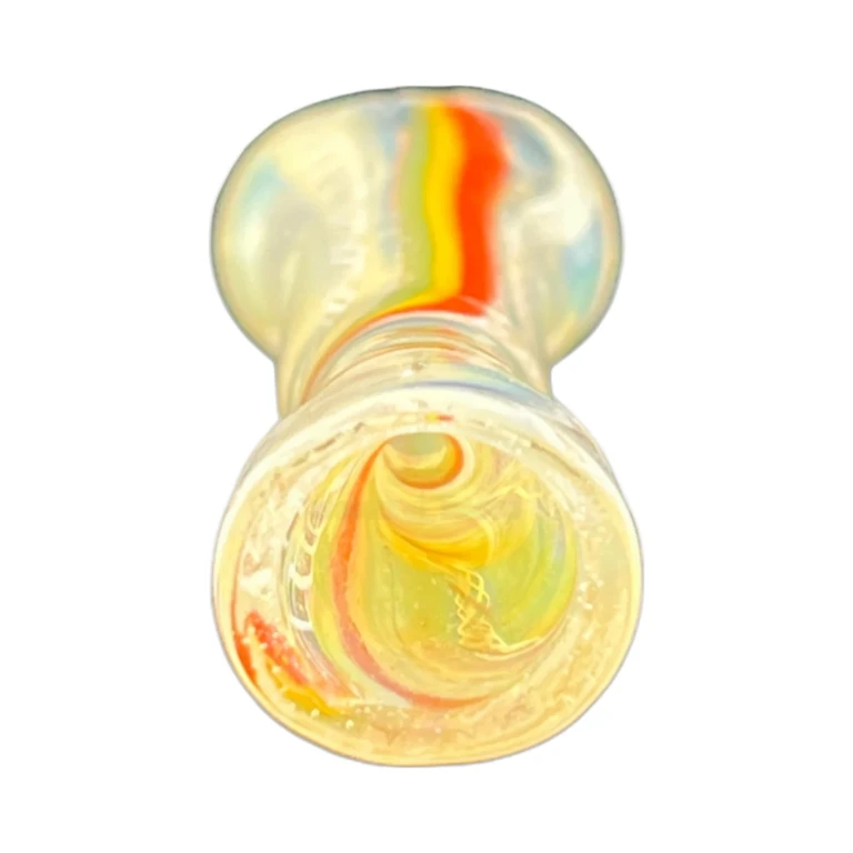 Bowl end of the clear amber glass chillum with yellow color swirls, a slim 3.5 inch one-hitter, in El Paso