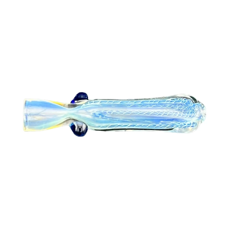 Side view of the black stripe blue dots borosilicate chillum showing rows of blue dots over teal glass, in stock in El Paso