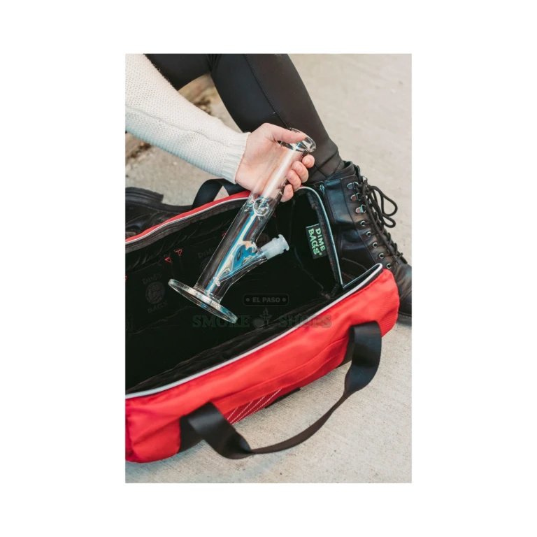Removable smell-proof stash baggie included with the Dime Bag Small 10 inch duffle in El Paso, discreet storage
