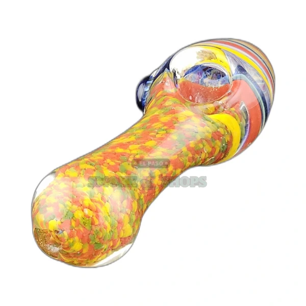 Conehead worked glass spoon pipe front view in El Paso, clear base with color spots and swirls, about 4.8 inches