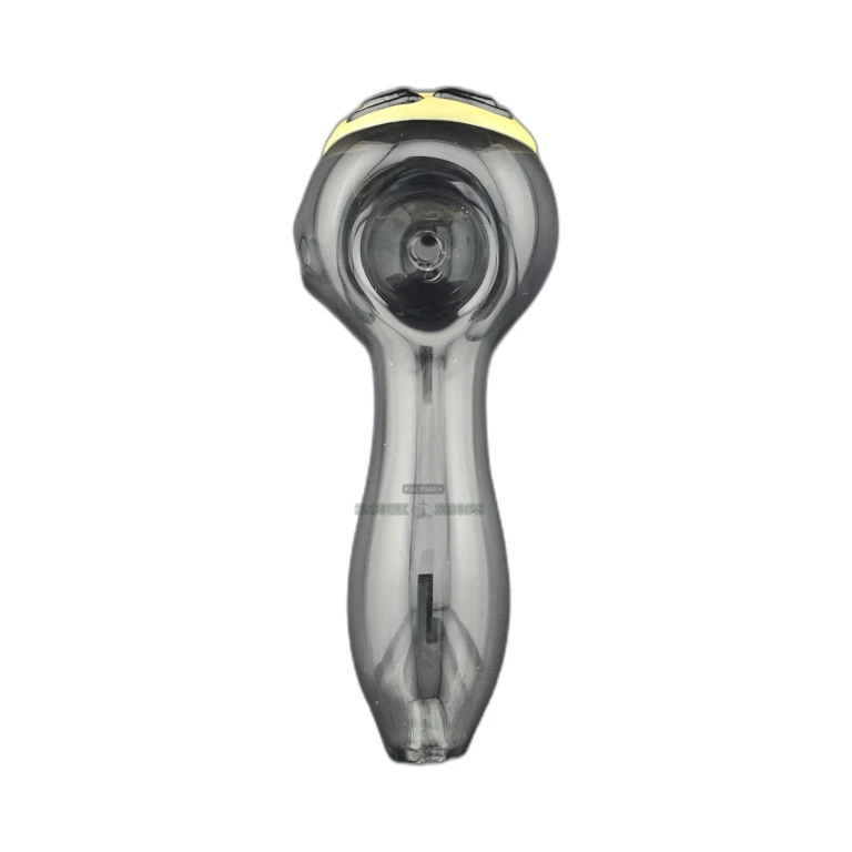 Minion face glass spoon pipe bowl close-up in El Paso, worked green bowl for tobacco use, pick up today