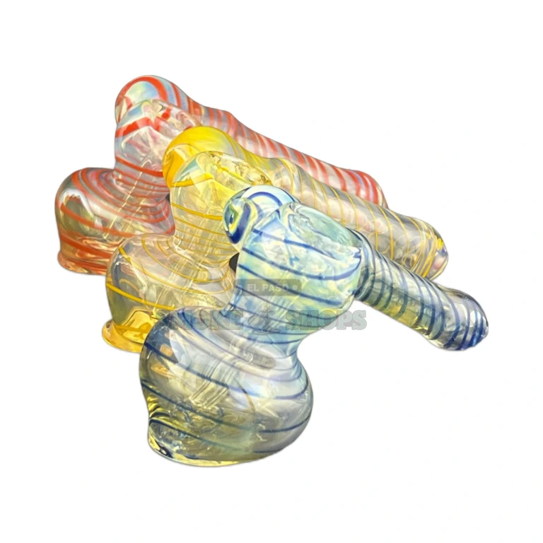Glass hammer bubbler in El Paso held in hand for scale, compact borosilicate water pipe with same-day in-store pickup